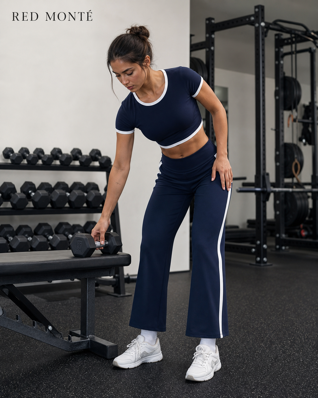 Red Monté navy wide-leg yoga pants and crop top styled on a strength gym floor