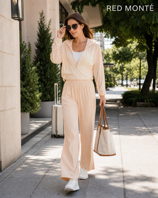 Red Monté milky apricot wide-leg active pants styled with a hooded jacket for a travel walk