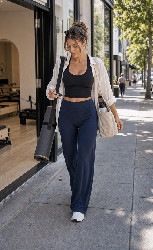 Red Monté navy wide-leg yoga pants styled after class for a city sidewalk
