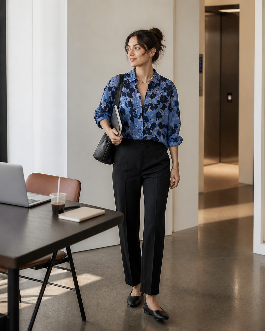 Red Monté blue ink-dot ramie shirt styled with black trousers in a bright office meeting space