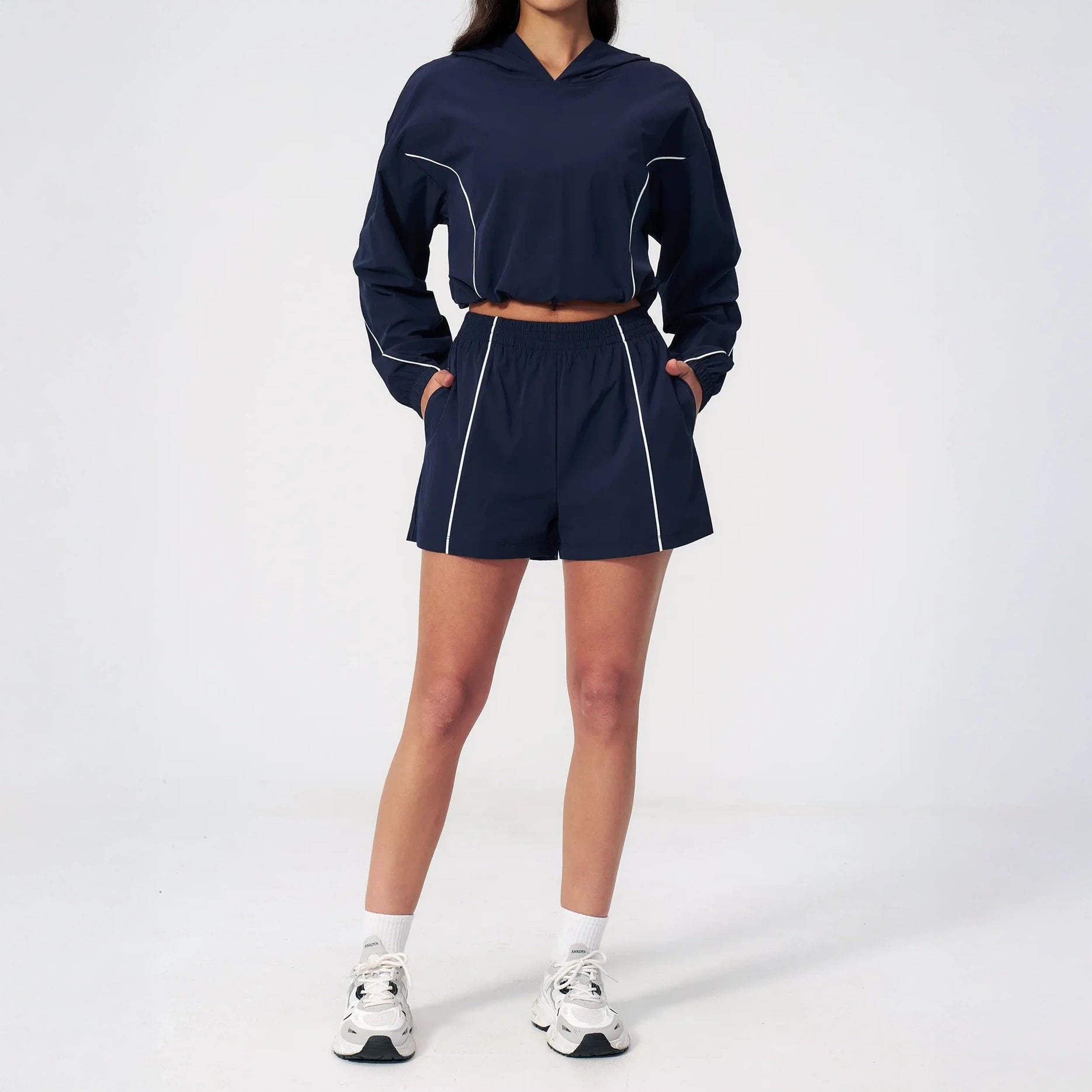 Red Monté navy quick-dry athletic shorts styled with a hooded active top